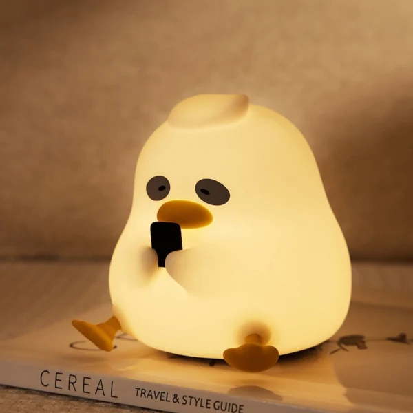 مصباح ليلي من السيليكون على شكل بطة ذات دائرة داكنة